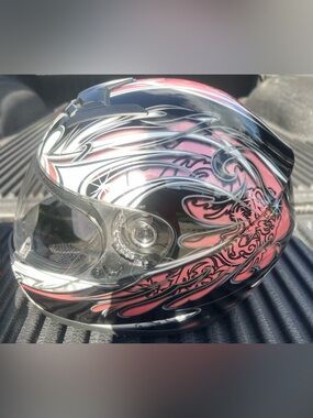 Pink and Black Full-Face Motorcycle Helmet - Stylish Graphic Design